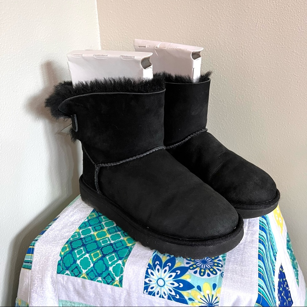 Ugg boot, size 6, black with bow